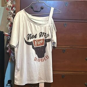 Graphic off the shoulder t, lined with “Not My First Rodeo”